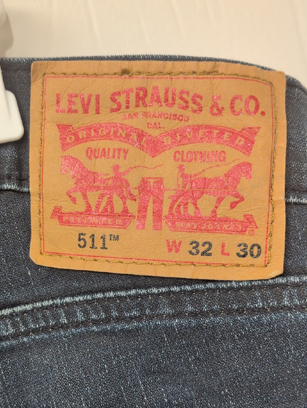 Levi's Men's Skinny Jeans in Dark Blue Denim with Tan Patch